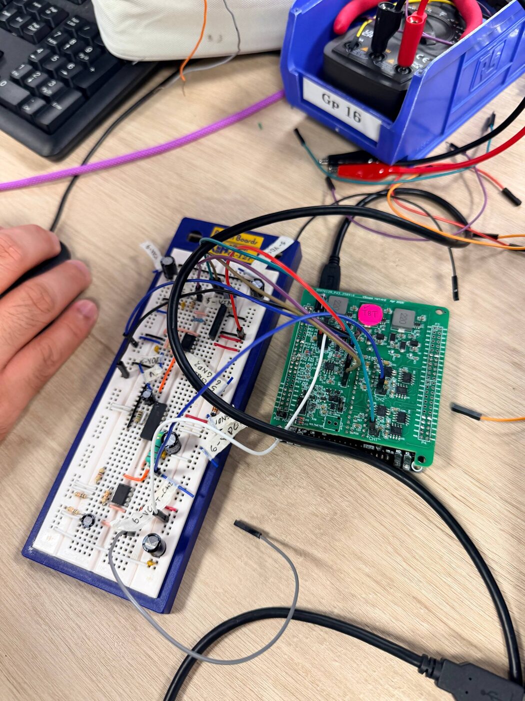 The audio amplifier built on breadboard, wired to the STM32 controller board, on the lab bench.